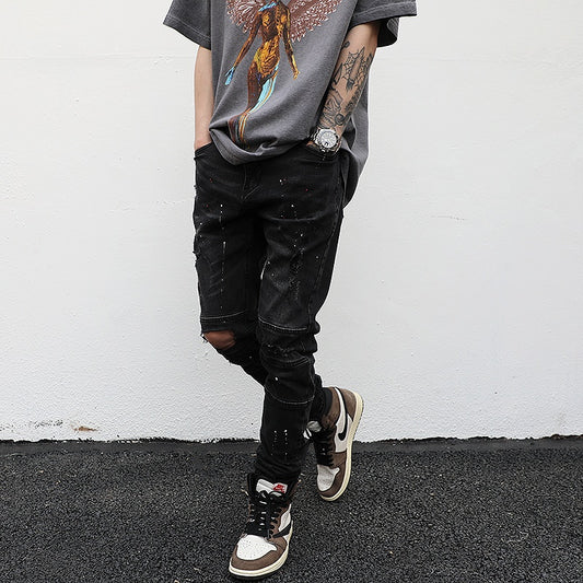 Elastic feet ripped trousers