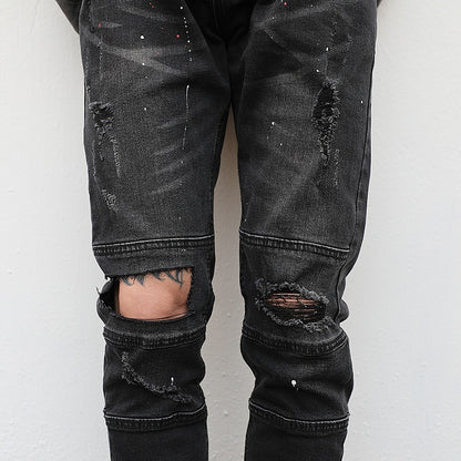 Elastic feet ripped trousers